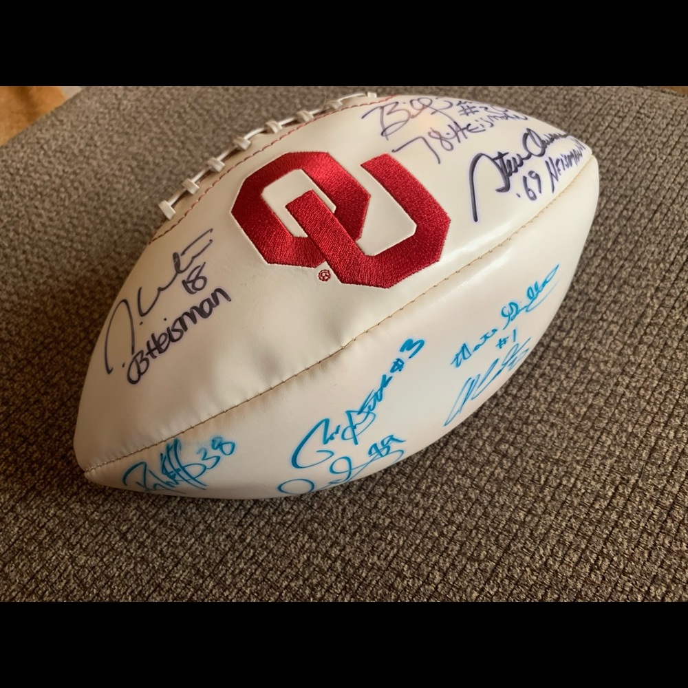 OU football signed by 3 heisman winners and 8 players total. Excellent condition